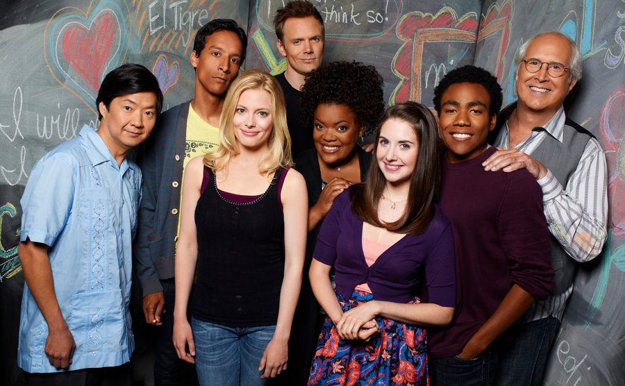 The cast of Community poses in a promotional portrait.