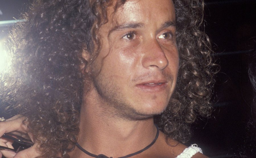 A dated photo of Pauly during a party.