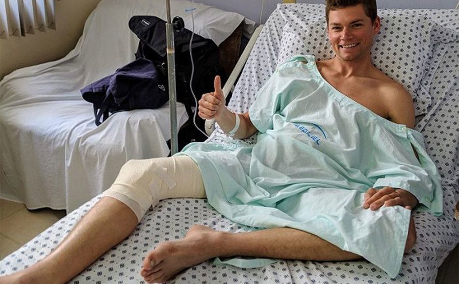 A photo of Alex at the hospital after being bitten by a shark.