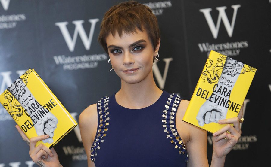 Cara Delevingne signs copies of her new book 