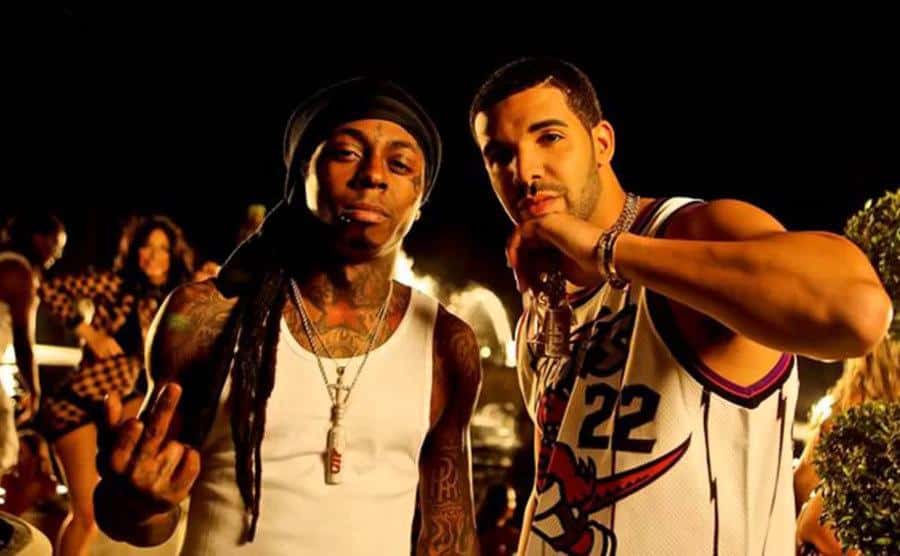 Drake and Lil Wayne perform together. 