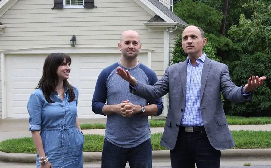 David Visentin shows off a home to a young couple. 