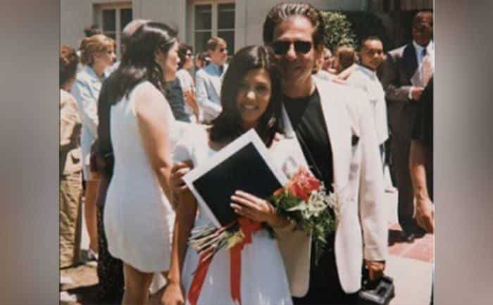 Kourtney and her father at her graduation. 